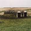 View from NW showing torpedo store huts.