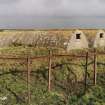 View from W of rear of torpedo store huts.