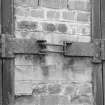 Detail of bomb store shed showing coupled hinges for doors.