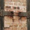 Detail of bomb store shed showing coupled hinges for doors.