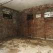 Interior view of bomb store shed showing location of 'safe working' notice.