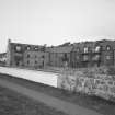 View from SW showing original building to left and new block to right