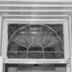 Interior. Detail of fan light to entrance vestibule
