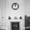 Ground floor, morning room, detail of fireplace and roundel