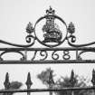 McGillivray enclosure, entrance gate, detail of decoration with date above (1968)