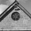 Cattle court, detail of circular window in south gable