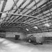 Interior. Cattle court, view of east bay from south