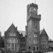 View of North West entrance tower and old school from North