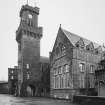 View of North West entrance tower and old school from West