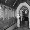 Interior. View of interior of link corridor from North looking into chapel with portrait bust