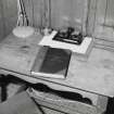 Interior. Detail of chaplains desk and visitors book