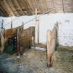Interior. View of byre with stalls