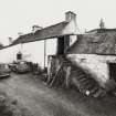 View of rear of farmhouse and byre from north east