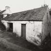 View of byre at north end of farmhouse from north east