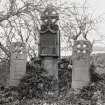 South corner of graveyard, Astley gravestone flanked (on either side) by two others, view from East