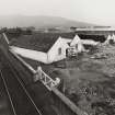 General view from SSE of distillery warehouses during demolition