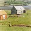 Sanday, Cnoc an Tionail. View of cottage from SW.