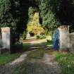 View of entrance piers and driveway.