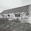 View of bank barn from SW showing windows inserted when it was converted into a craft studio in the 1970's under the guidance of Mr Keith Schellenberg.