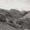 General view of valley, showing conduit in middle distance left to centre..