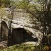 Curved section of conduit aquaduct north of third sidestream, from south east.