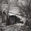 Curved section of conduit aquaduct north of third sidestream, from south east.