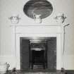 Detail of fireplace in dressing room over the dining room