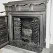 Detail of fireplace in dressing room on North side