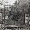 View of wrought iron gate with initial M for Lady Monica Bullough