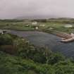 Muck, Port Mor House and Port Mor, Pier Cottage. Hotel, quay, cottage and gear store. View from SW.