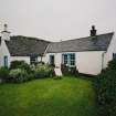 Muck, Gallanach. Cottage. View from ESE.