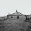 Muck, Gallanach, New House. Bungalow. View of rear elevation from SW.