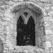 Interior. Traceried window at E end of S wall, view from N