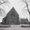 W gable of church and presbytery. View from W