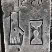 Tomb-slab showing hand and chalice,  from Cullicudden burial ground, Highland.