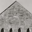 Fearn Abbey.  Detail of East gable showing blocked venetian window in apex.