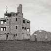 Fearn Airfield Naval Control Tower.  View from SE showing Nissen hut to rear.