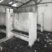 Fearn Airfield, Loans of Tullich accommodation camp.  Hospital block interior view of cubicles at S end of shower room.