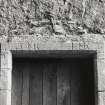 Detail of lintel above door on west gable