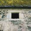 Detail of vent/window on south face of barn