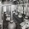 Interior. Still House, elevated view from SE showing all 8 stills, wash stills to right, and control panel (bottom right).