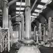 Interior. Still House, detail of typical wash still, showing the unique tall shape of Glenmorangie's stills (the tallest pot stills in Scotland).