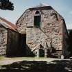 View from South East of external stairs to granary above byre