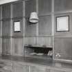 Interior. Dining room detail of panelling, serving hatch and original sideboard