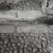 Detail of cobbled floor and drain in Stable