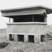 View from NE of the Battery Observation Post showing viewing platform, canopy and brick foundation pillars.