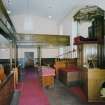 Interior. View from W showing pulpit and galleries