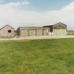 Tain Airfield, No.4 dispersal site. Garage and transport buildings re-used from original Bombing Range, view from S.