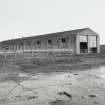 Tain Airfield technical site, view of repair shop building to E. of Control Tower from SW.