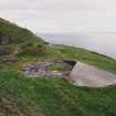 View from W showing two eastern gun-emplacements with concrete  aprons.